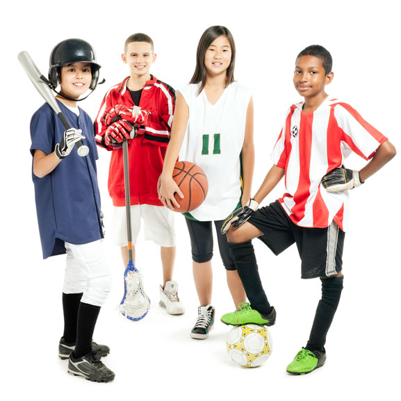 3 boys, 1 girl wearing baseball, soccer, basketball uniforms